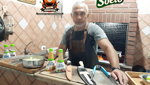 Beto cunha o seu churrasqueiro